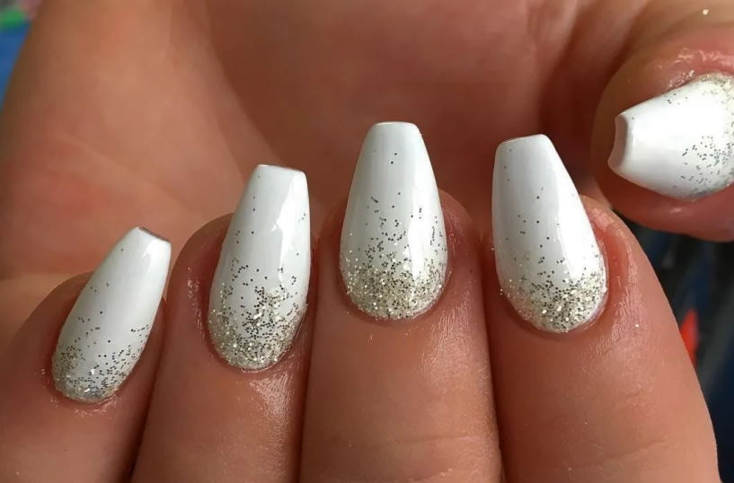 painting your nails with white polish